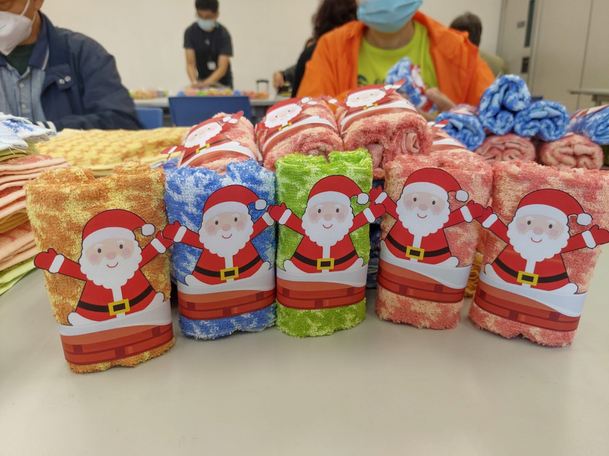 Volunteers prepare gifts or festival event